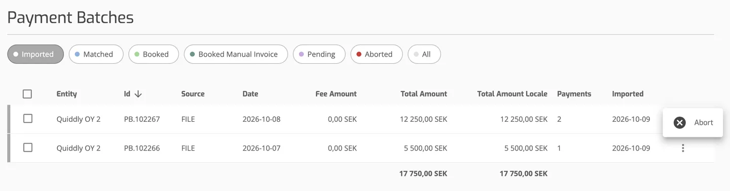 The Payment Batches list on the Imported tab with two batches and the row action menu open, showing Abort.